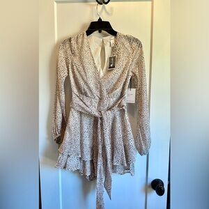 Neutral ruffle romper